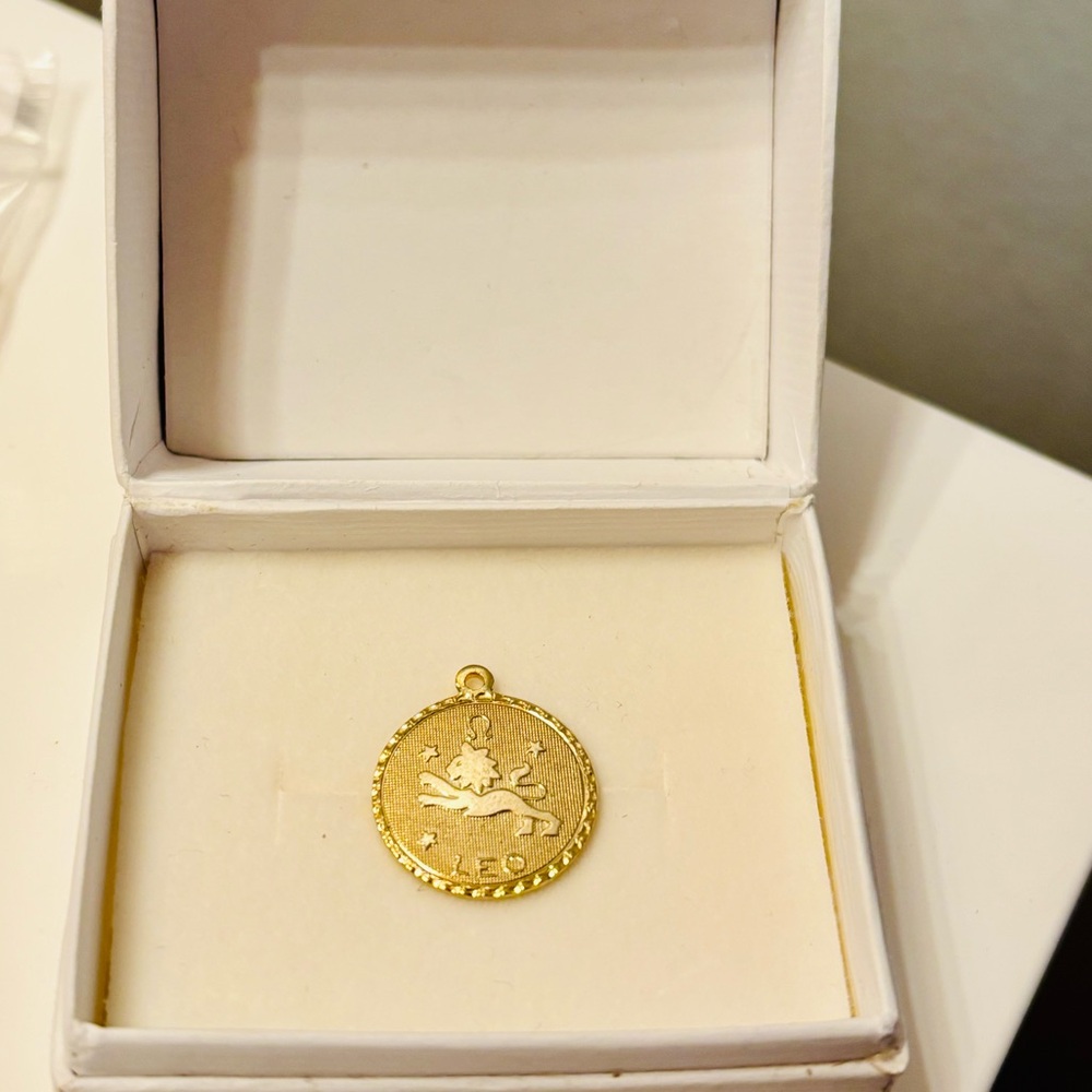 3/$30 Leo Zodiac Pendant - gold tone